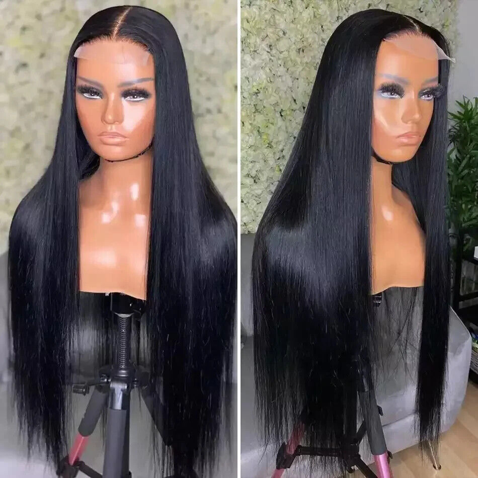 Black straight wig on a mannequin head with a blurred background