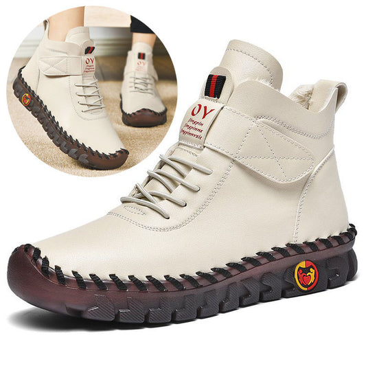 Beige high-top boots with brand logo on a white background
