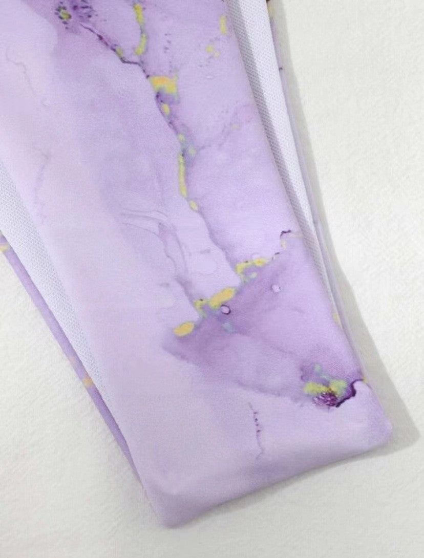 Purple marbleized phone case on a white background