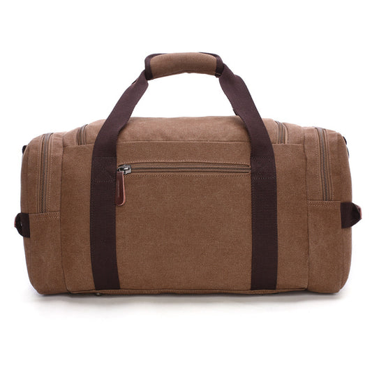 Brown duffel bag with brown straps on a white background