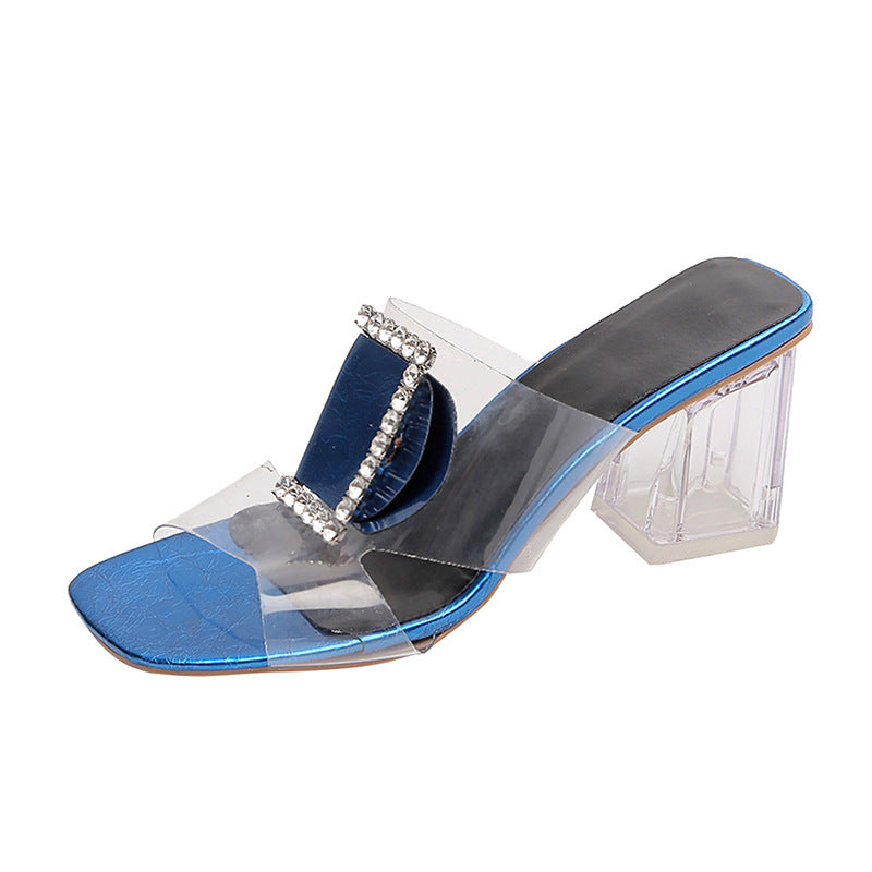 Blue sandal with clear heel and transparent strap on a white background