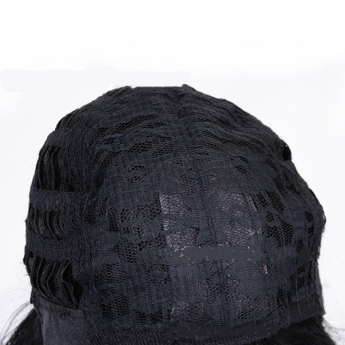Black lace wig cap on a white background