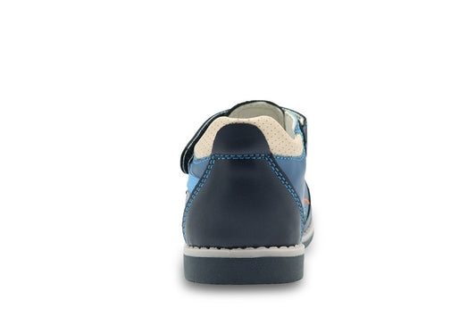 Navy blue shoe with white sole on a white background