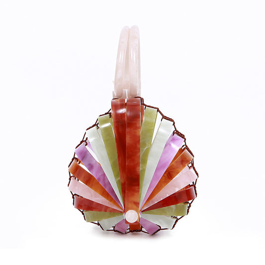 Decorative fan-shaped object with colorful stripes on a white background