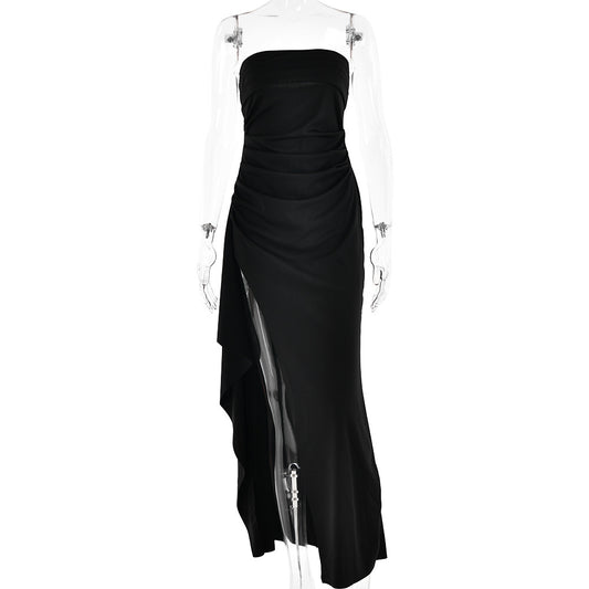 Black strapless gown on a mannequin with a white background