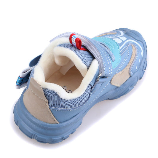 Blue children's shoe with a white interior on a white background