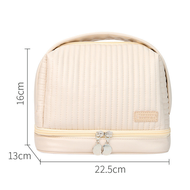 Beige cosmetic bag with dimensions labeled on a white background