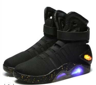 Black high-top sneakers with glowing sole on a white background