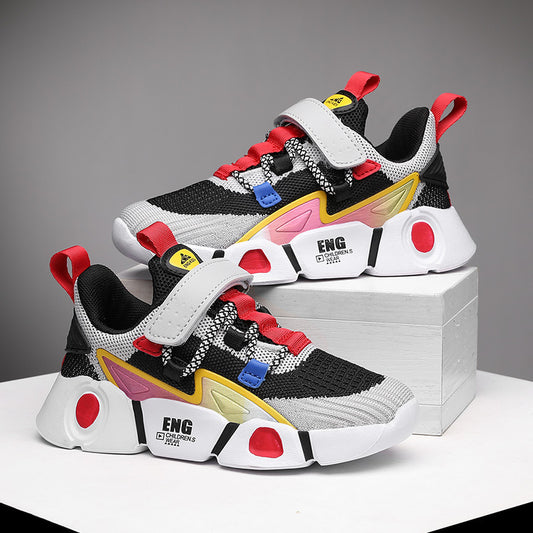 Colorful sneakers with black, red, and white design on a gray background