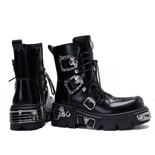 Black leather boots with metal buckles and accents on a white background