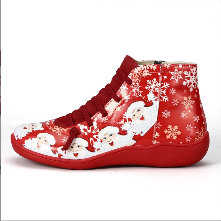 Red high-top sneaker with Santa Claus and snowflake pattern on a white background