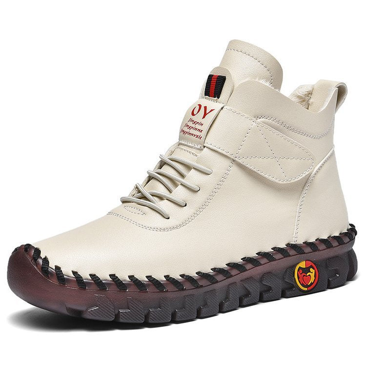 White high-top boot with brown sole on a white background