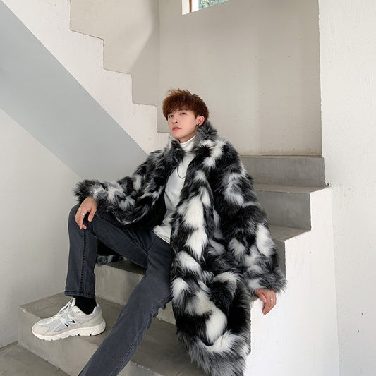 Person wearing a fur coat sitting on stairs indoors