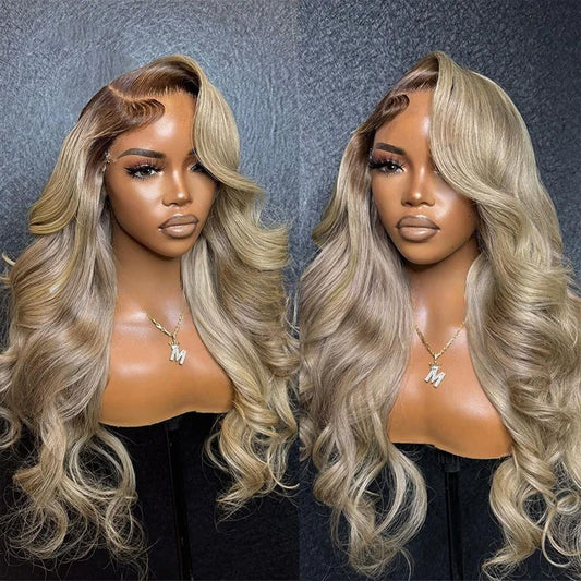 Two mannequins with long blonde wigs against a gray textured background