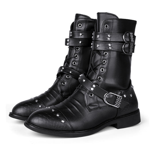Black leather boots with studded details on a white background