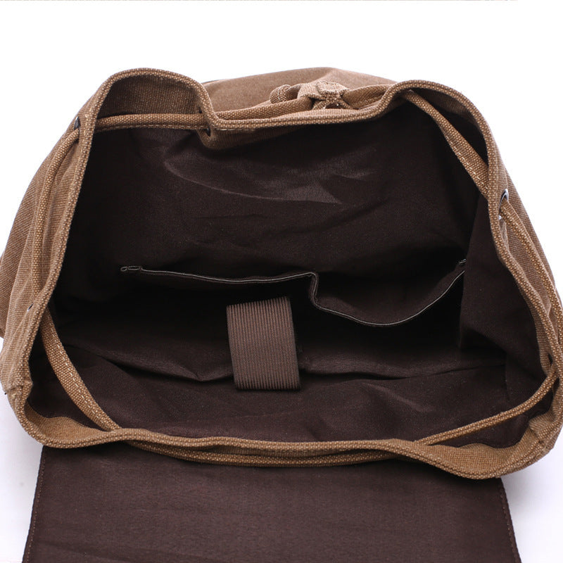 Brown bag with a strap on a white background