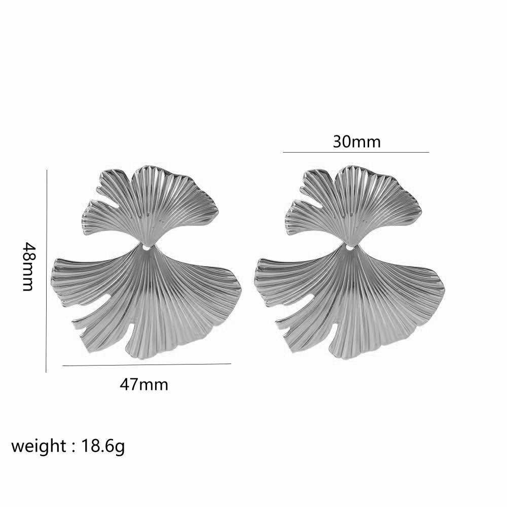 Silver leaf-shaped earrings with measurements on a white background