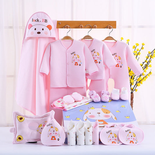 Baby clothing set with pink outfits, hats, and accessories on a white background