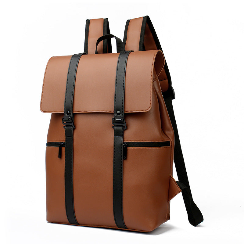 Brown backpack with black straps on a white background