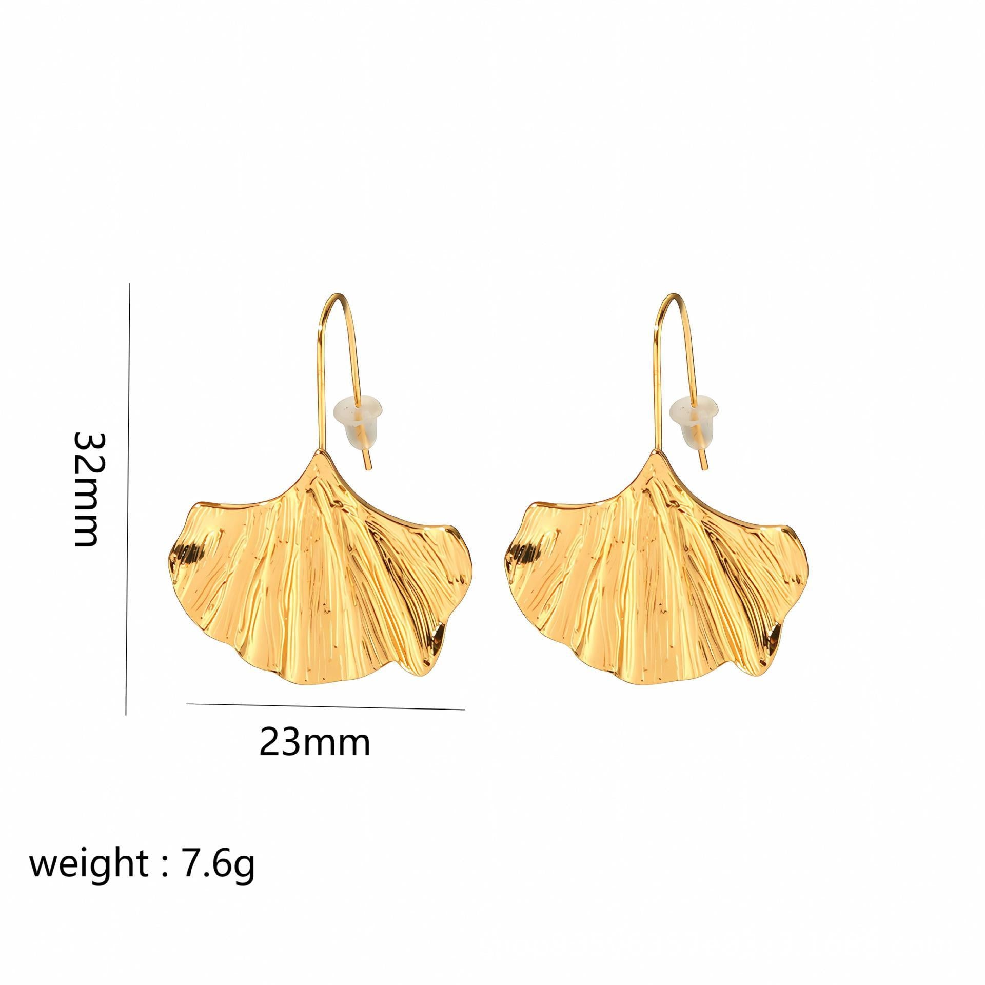 Gold leaf-shaped earrings with measurements and weight on a white background