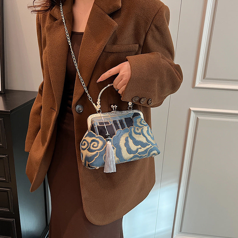 Xiangyun retro Chinese style handbag for women featuring traditional embroidered patterns inspired by the Ming and Qing dynasties - authentic silk and cotton handbag with cultural significance - Millivan Supplies