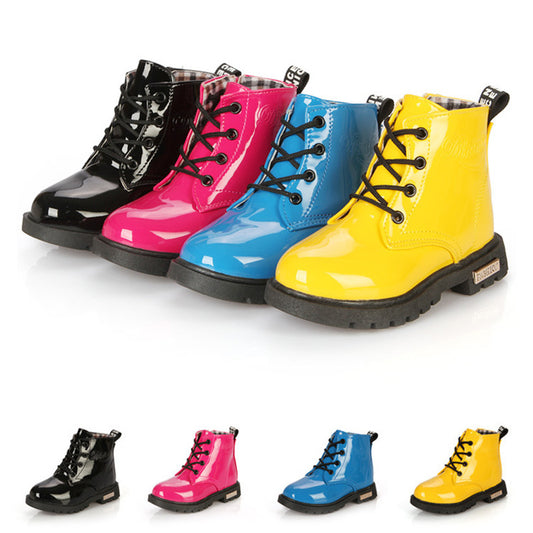 Four pairs of colorful patent leather boots on a white background
