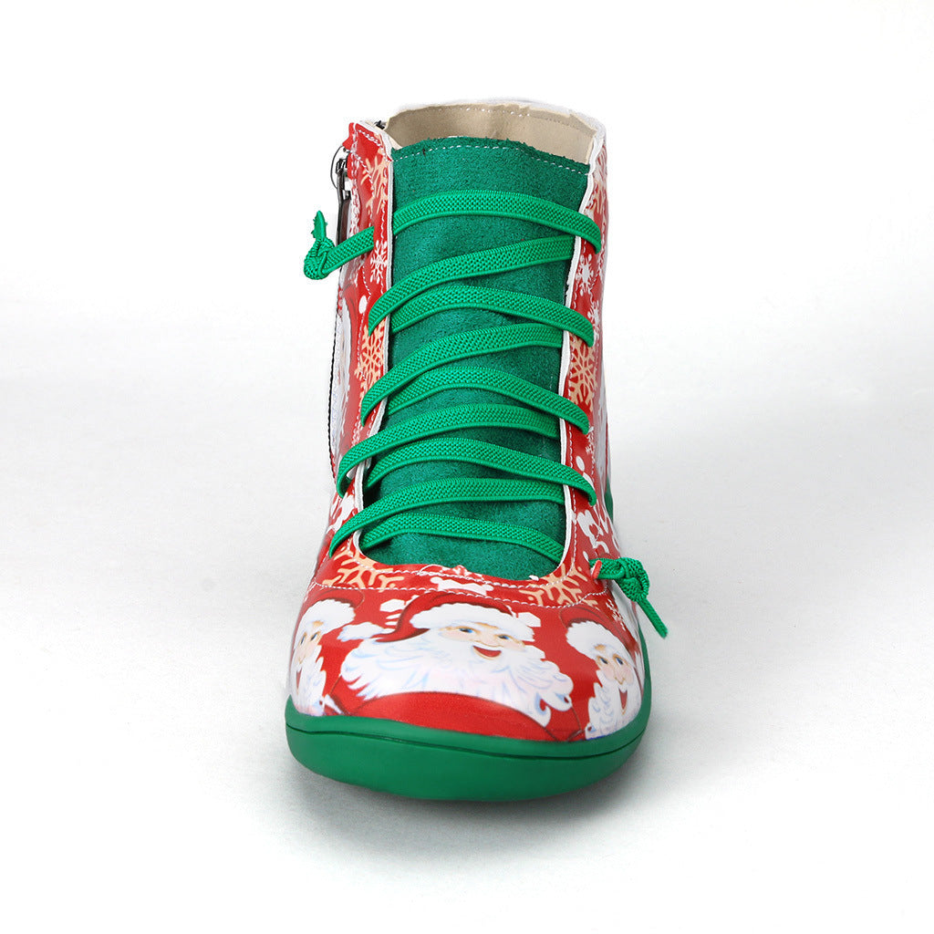 High-top sneaker with floral pattern and green laces on a white background