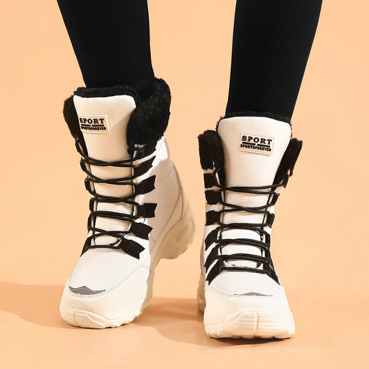 White high-top sneakers with black laces and fur lining on a beige background