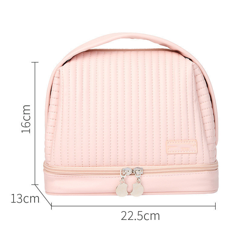 Pink toiletry bag with dimensions on a white background