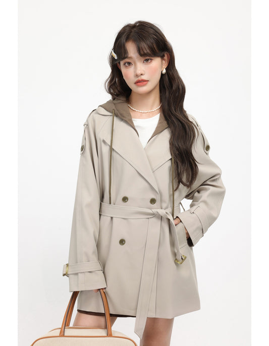 Woman wearing a beige trench coat on a white background by millivan