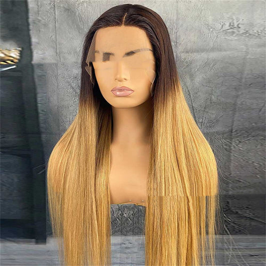 Mannequin head with a long blonde wig on a gray textured background