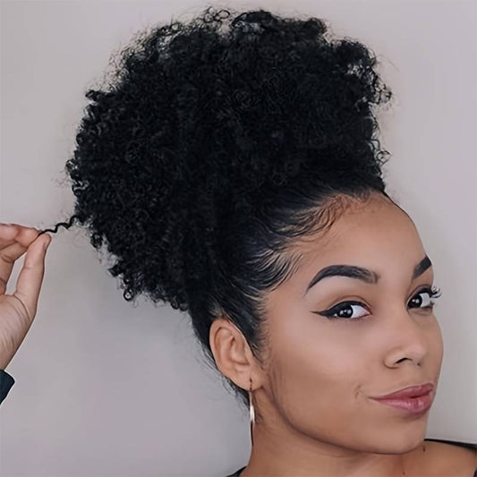 Woman with styled hair against a neutral background