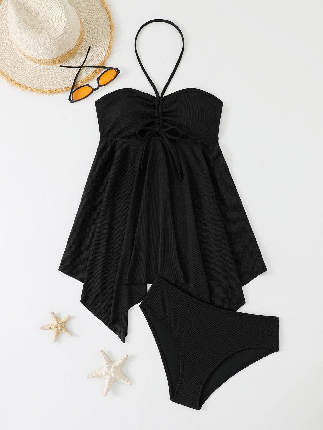 Black strapless swimsuit with matching bottoms on a white background
