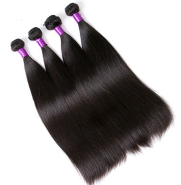 Four bundles of straight black hair extensions with purple ties on a white background