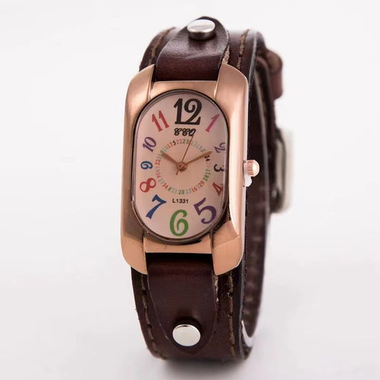 Wristwatch with brown leather strap and multicolored dial on a white background