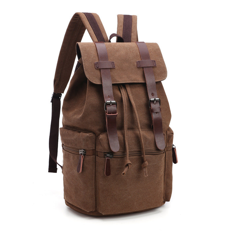Brown backpack with leather straps on a white background
