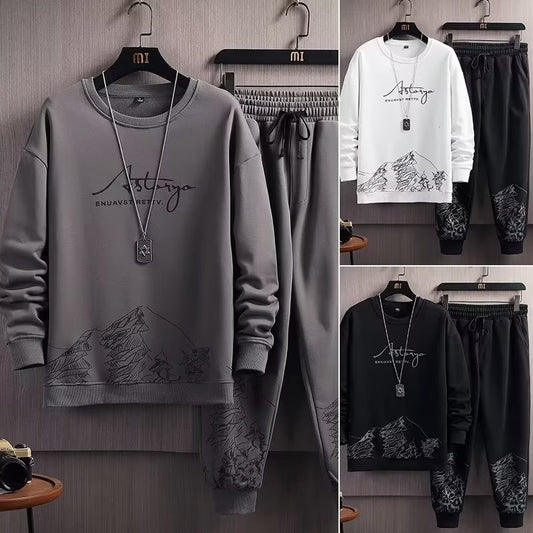 Collage of gray sweatshirt and pants with mountain design and 'Astley' branding.