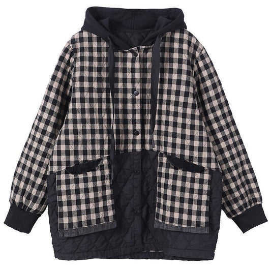 Plaid jacket with black accents on a white background
