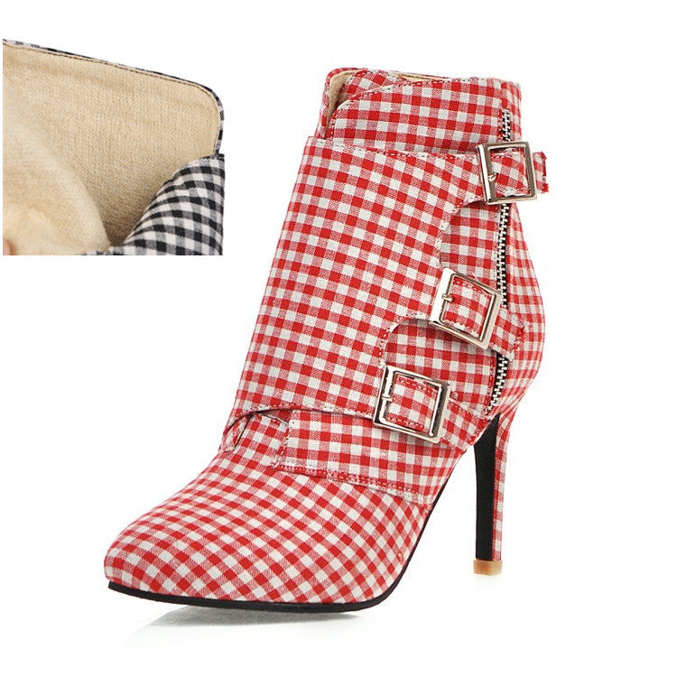 Red and white checkered boot with buckles on a white background