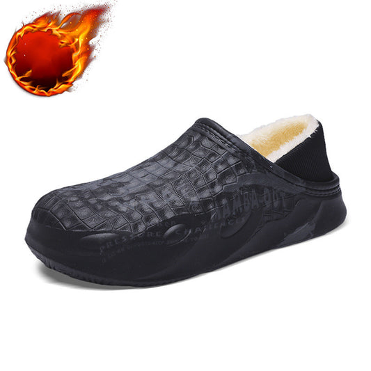 Black slip-on shoe with flame icon on a white background