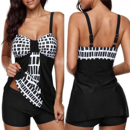 Black and white patterned two-piece swimsuit on a model against a white background