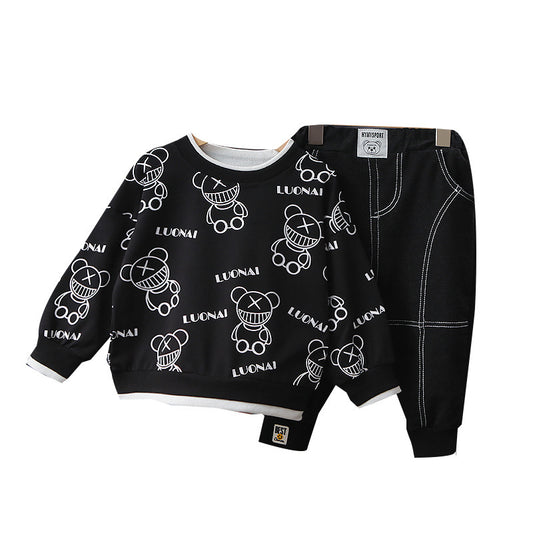 Black sweatshirt with white graphics and black shorts on a white background