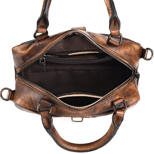 Brown leather duffel bag with open top on a white background