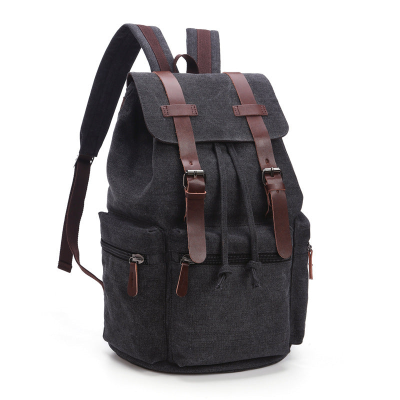Gray backpack with brown straps on a white background