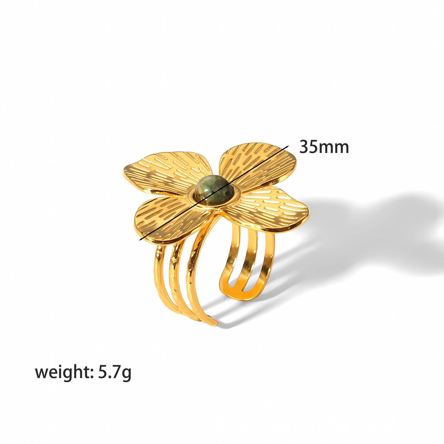 Gold flower-shaped ring with measurements and weight on a white background