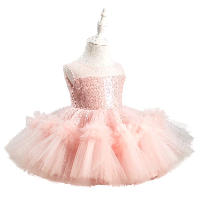 A pink toddler girl's sequined tutu dress displayed on a white mannequin dress form against a solid white background.