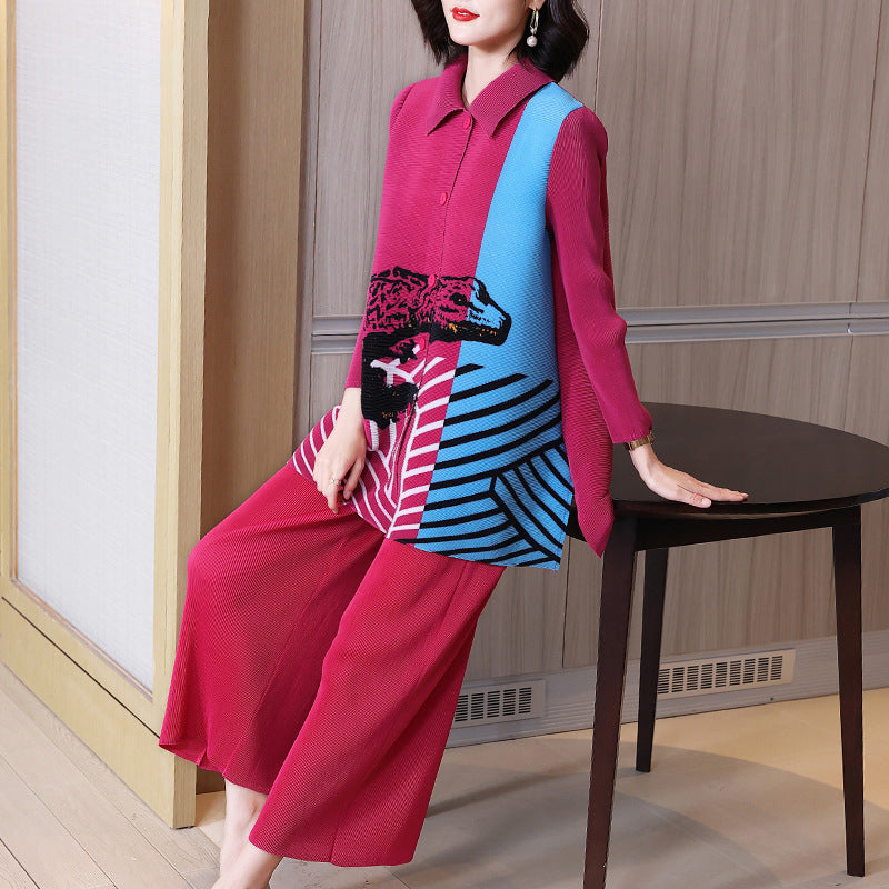 Woman wearing a colorful outfit with a pink shirt and red pants, standing in an indoor setting.