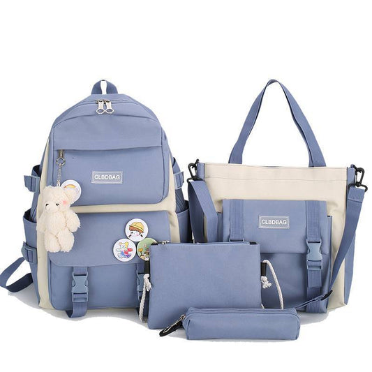 Set of blue bags including a backpack, tote bag, and pouches on a white background