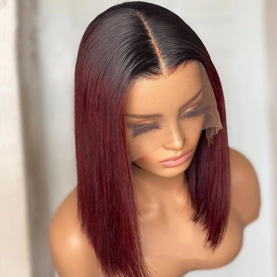 Person with burgundy straight bob wig on a neutral background