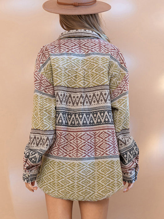 Person wearing a patterned long-sleeve shirt and skirt with a beige background
